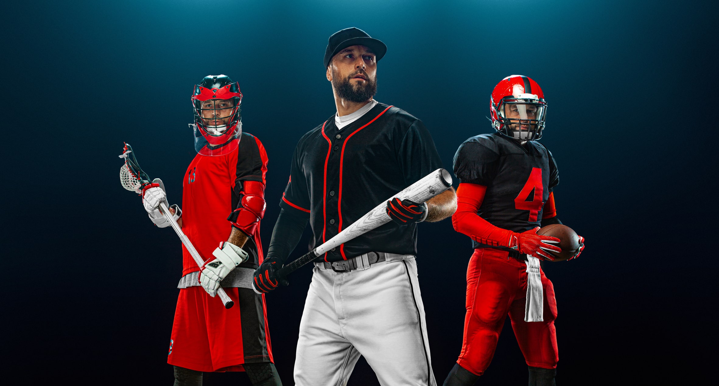 Group of athletes. Professional american football player in helmet with ball, lacrosse player with stick, and baseball player with bat. Sport and motivation wallpaper.